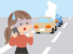交通事故にあって電話する女性